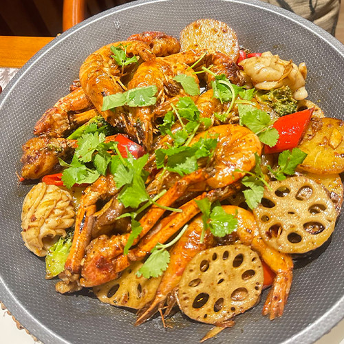 MARISCOS Y VERDURAS SALTEADO CON SALSA SICHUAN