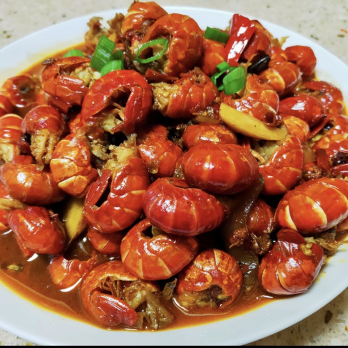 Cola de cigala con salsa  picante